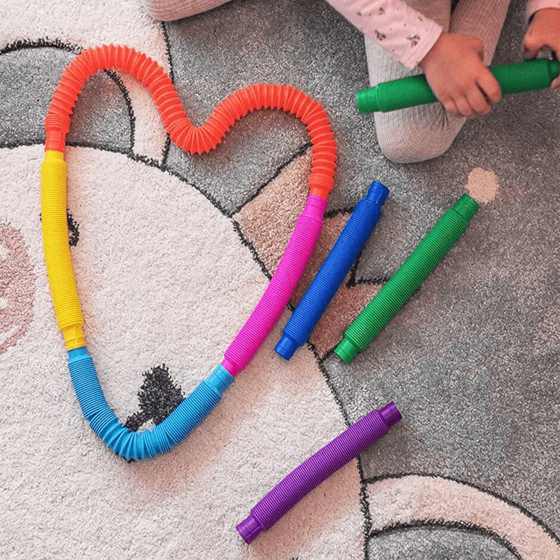 Värikäs pop-up-lelu – aistillinen ja venyvä lelu lasten luovuuden ja motoristen taitojen kehittämiseen