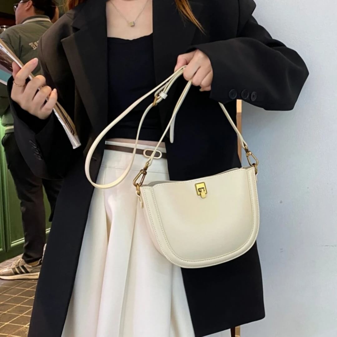 Saddlelux - Ylellinen minisatulalaukku aidosta naudannahasta.